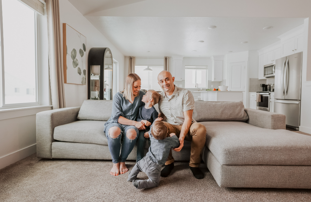 family in their kartchner home living room