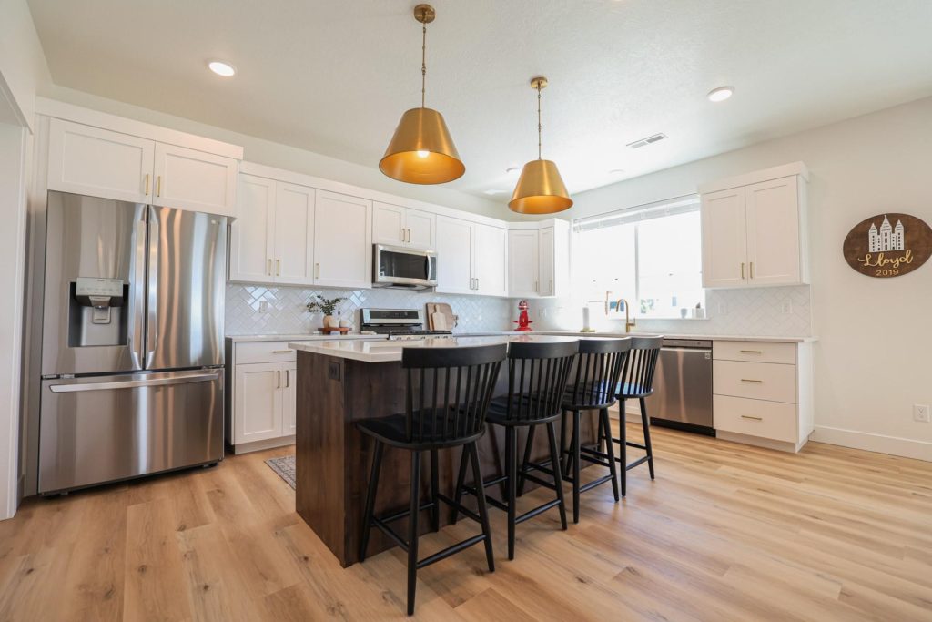 The Savannah floor plan boasting gold hardware and pendant lights.